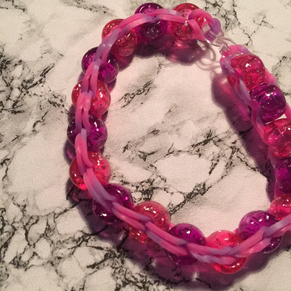 Pink band with pink and purple bead